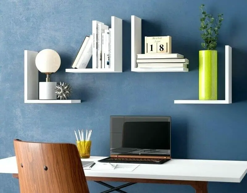 Use wall shelves to organize desk